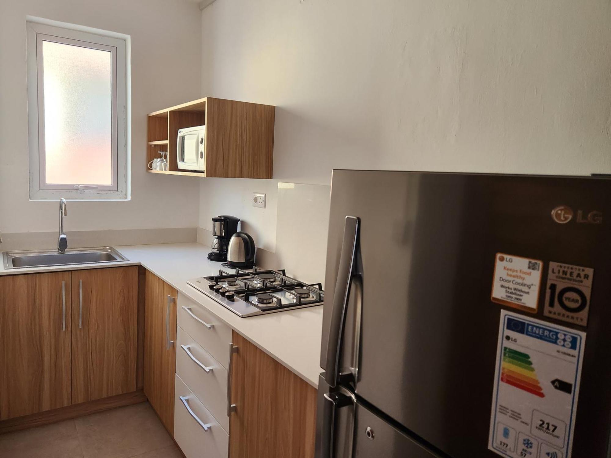 La Perla Holiday Apartments Pereybere Beach Quarto foto